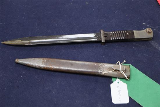 A WWII Third Reich Manser K98 bayonet and scabbard S.817, code WA 883